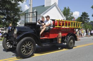 Early Bradford Fire Truck driven by Piermont Firefighters Steve Sampson and Holly Creamer